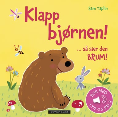 Omslag av "Klapp bjørnen ... så sier den BRUM!"